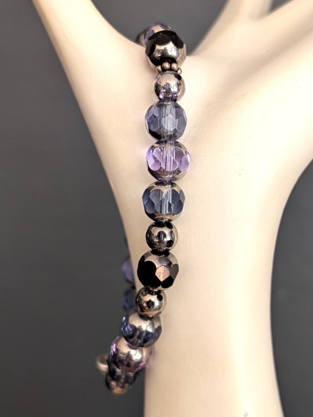 Light and dark purple, blue and silver beaded bracelet